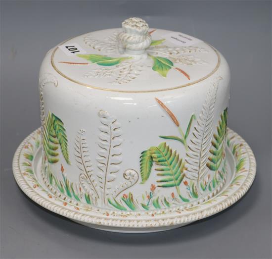 A Victorian Staffordshire pottery circular cheese dish and cover, decorated with ferns